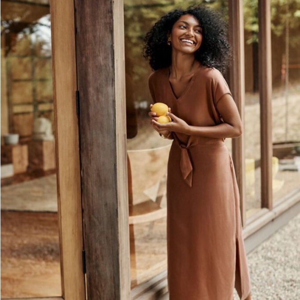 amour vert rusty-colored linen midi wrap dress with a V-neck and a tie belt